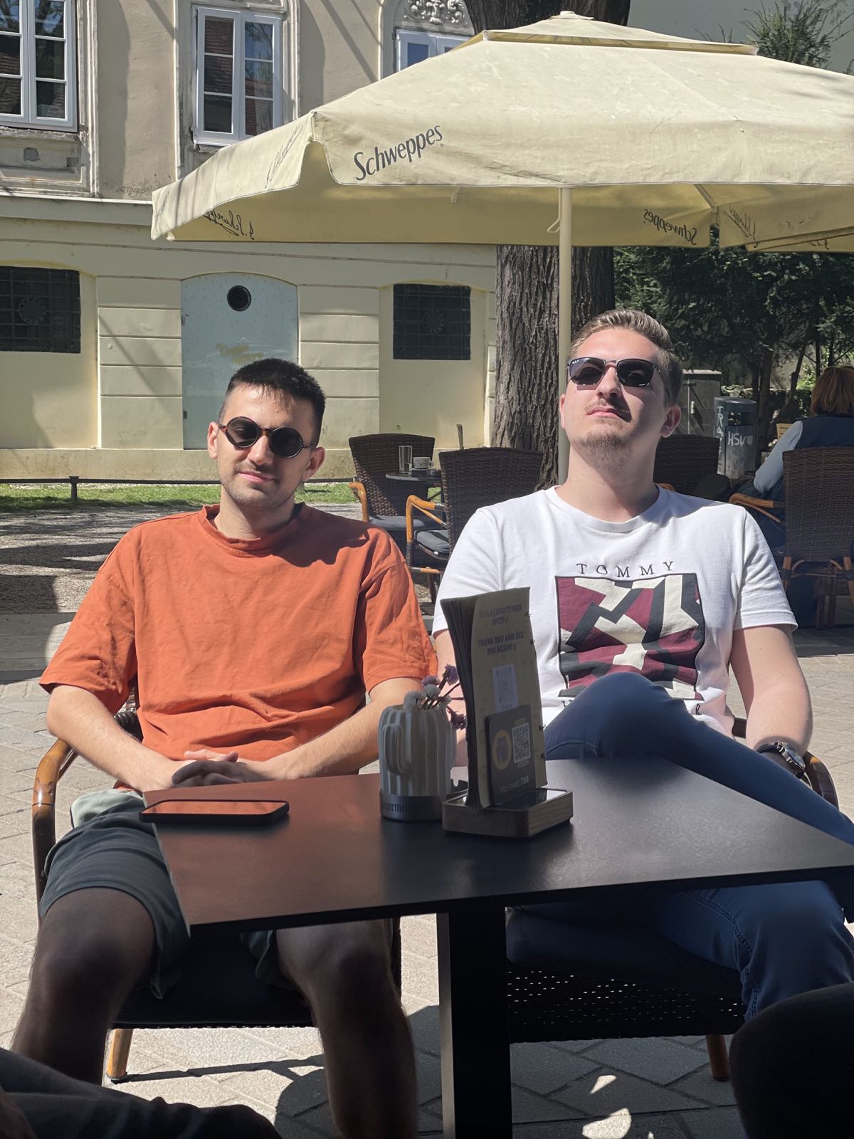Two brainit AI engineers chilling at a café